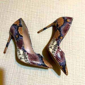 Stunning snake price heels